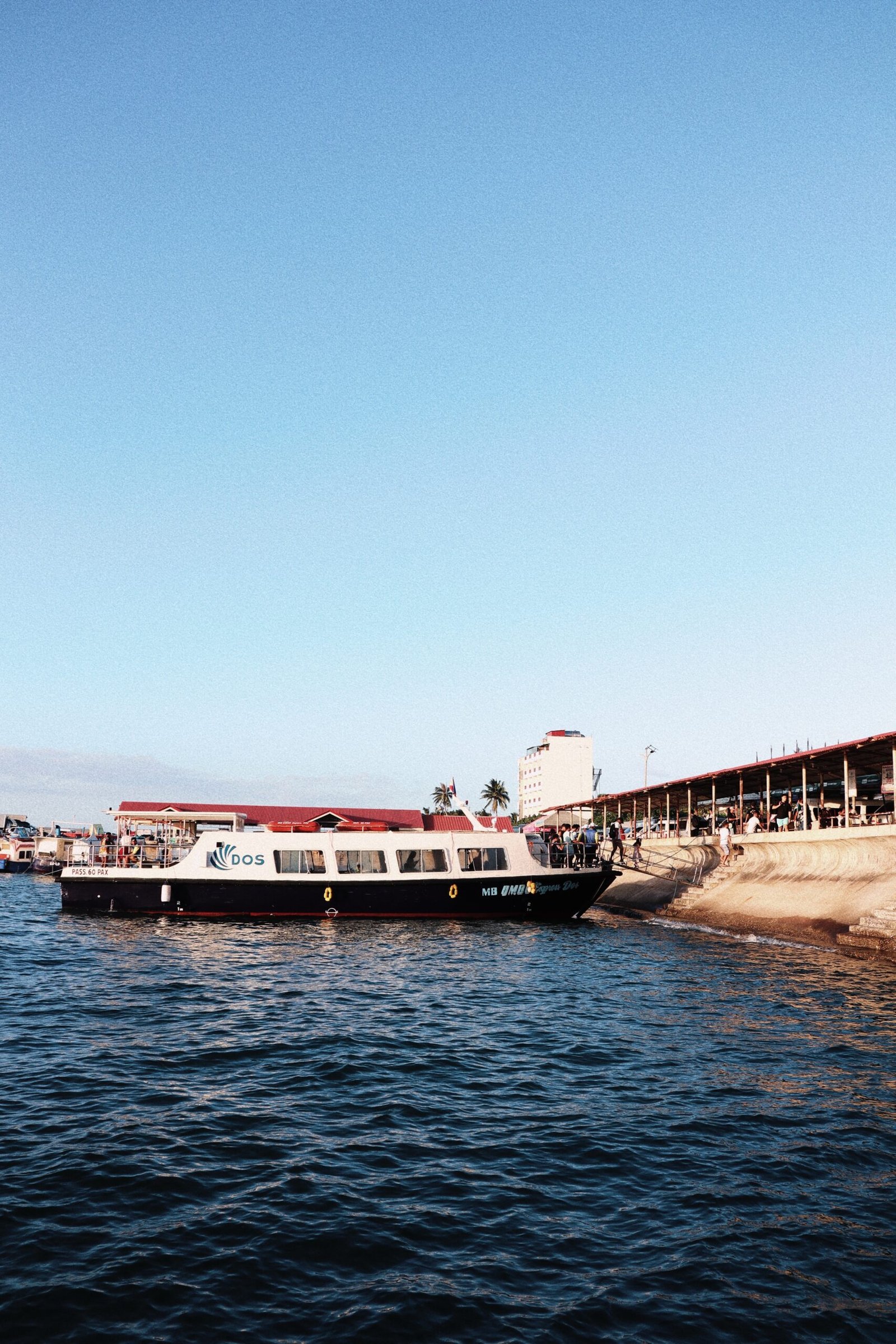 a large boat floating on top of a body of water